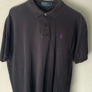 Worn black polo